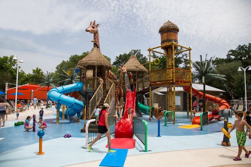 Water playground featuring splash pad and water park equipment at the Fort Worth Zoo